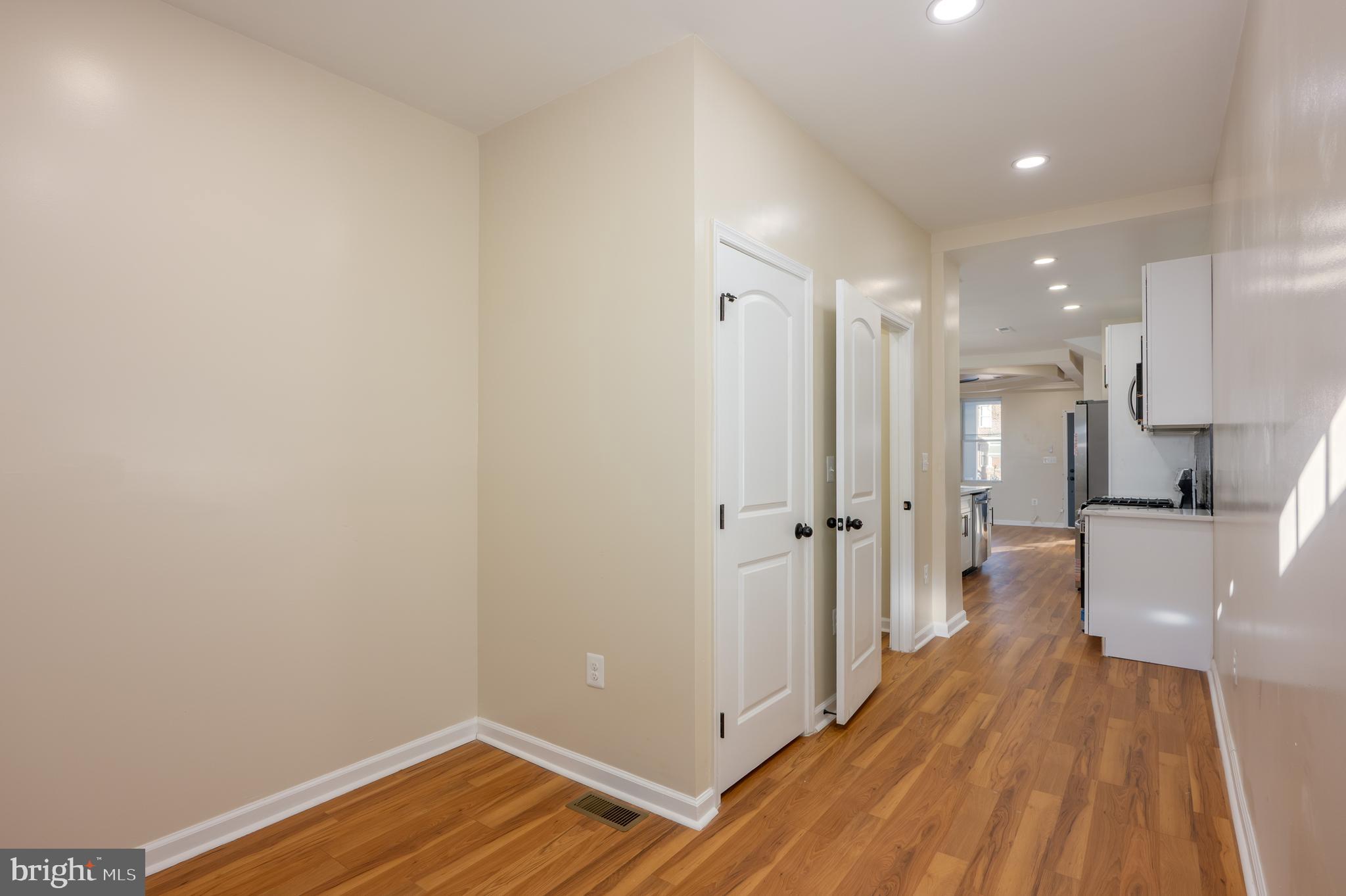 3121 Sequoia Avenue Baltimore, MD 21215 - Photo 12 of 30 a view of a room with wooden floor