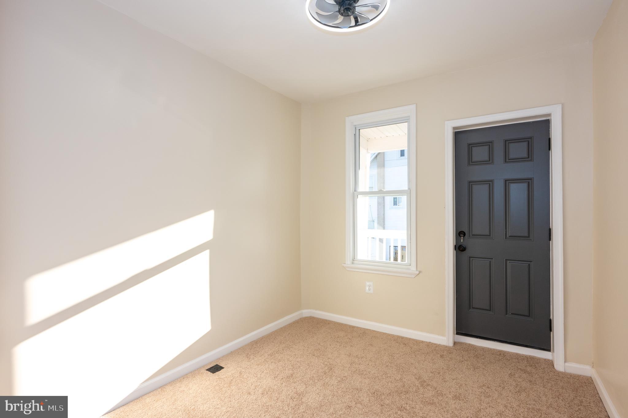 3121 Sequoia Avenue Baltimore, MD 21215 - Photo 15 of 30 a view of an empty room and window