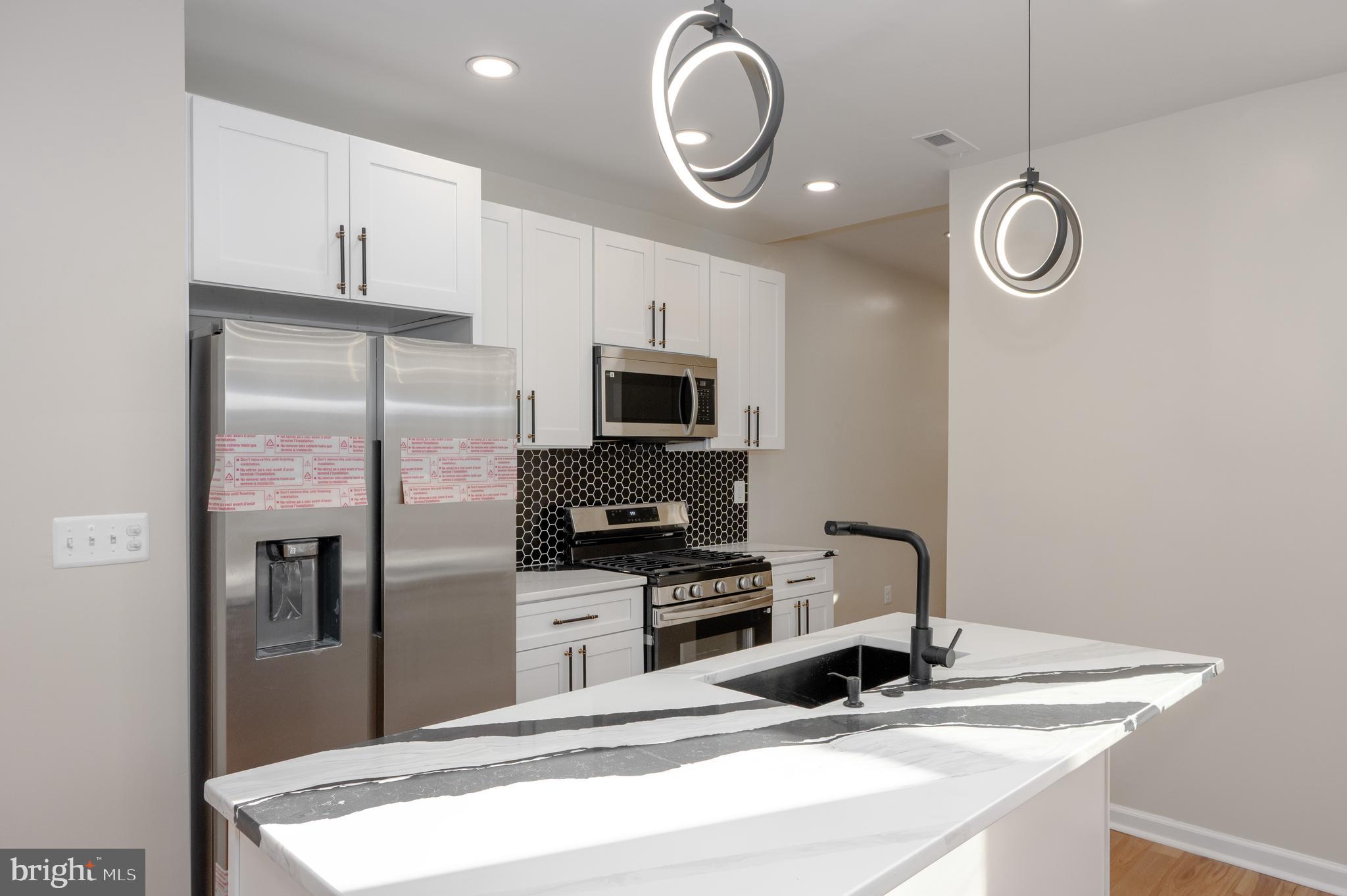 3121 Sequoia Avenue Baltimore, MD 21215 - Photo 2 of 5 KITCHEN ISLAND