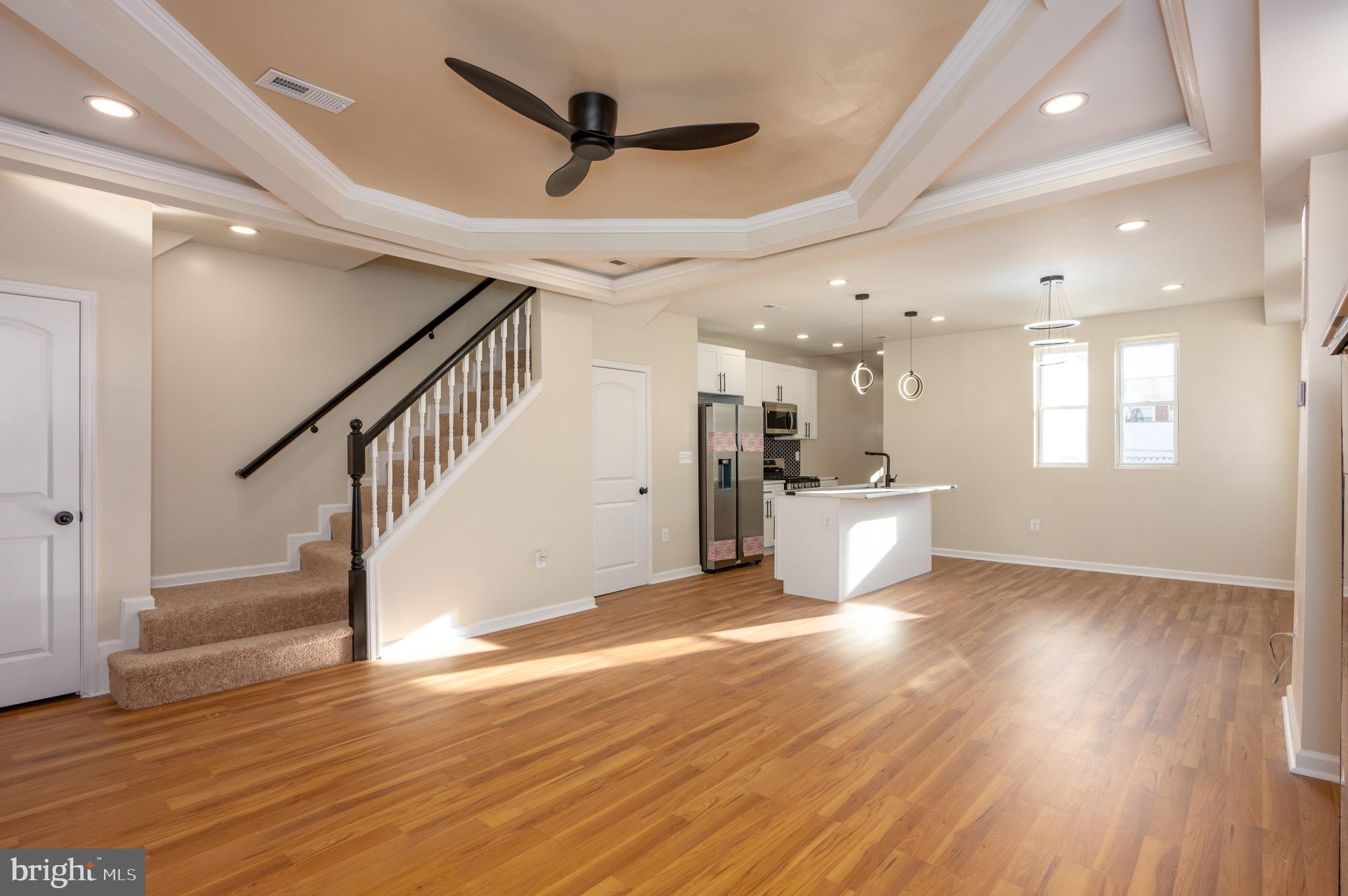 3121 Sequoia Avenue Baltimore, MD 21215 - Photo 6 of 30 a view of an empty room and wooden floor