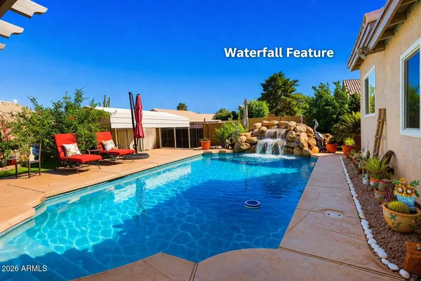 a view of a house with a swimming pool