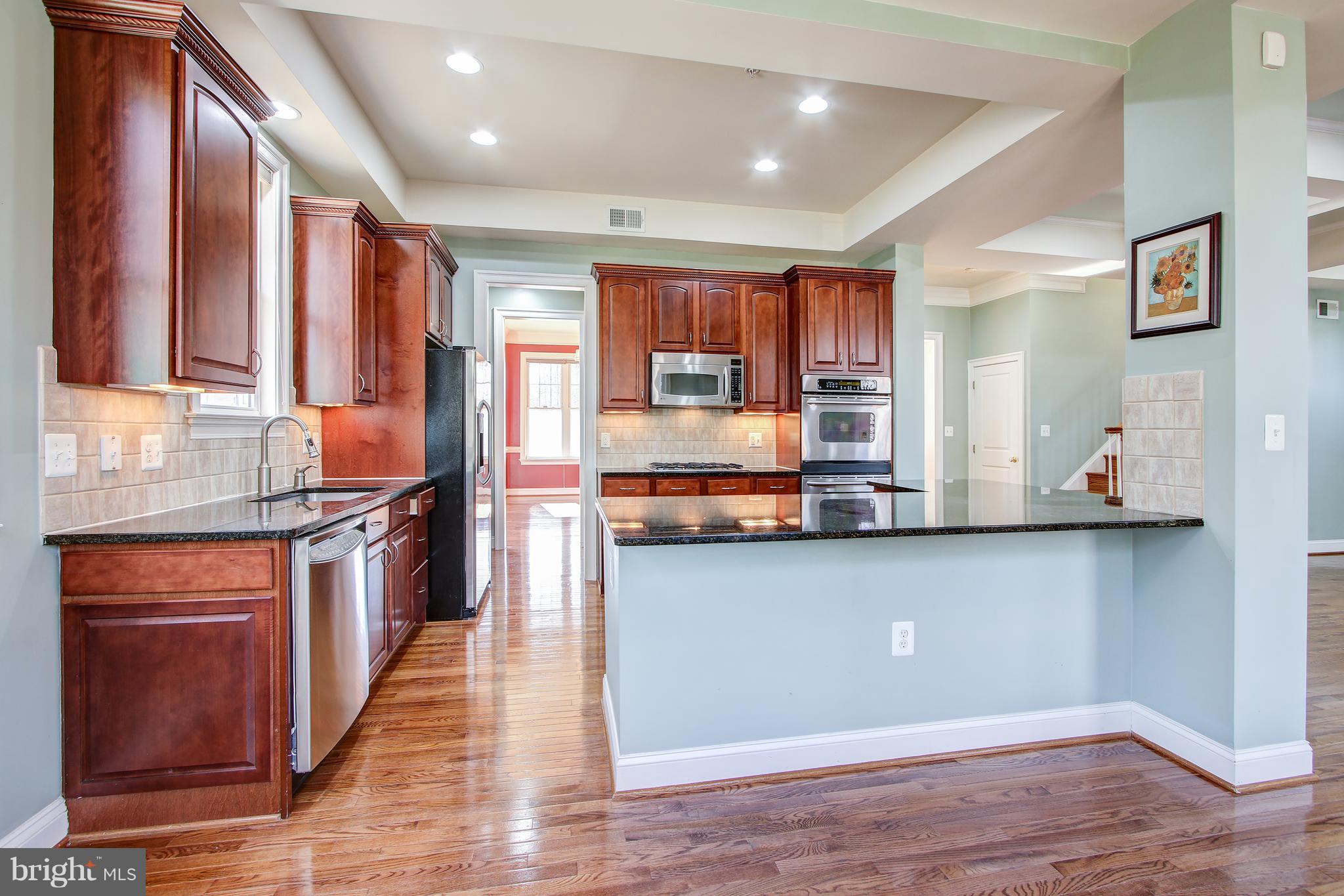 9126 Georgia Avenue Silver Spring, MD 20910 - Photo 14 of 40 Large Kitchen Island with granite top