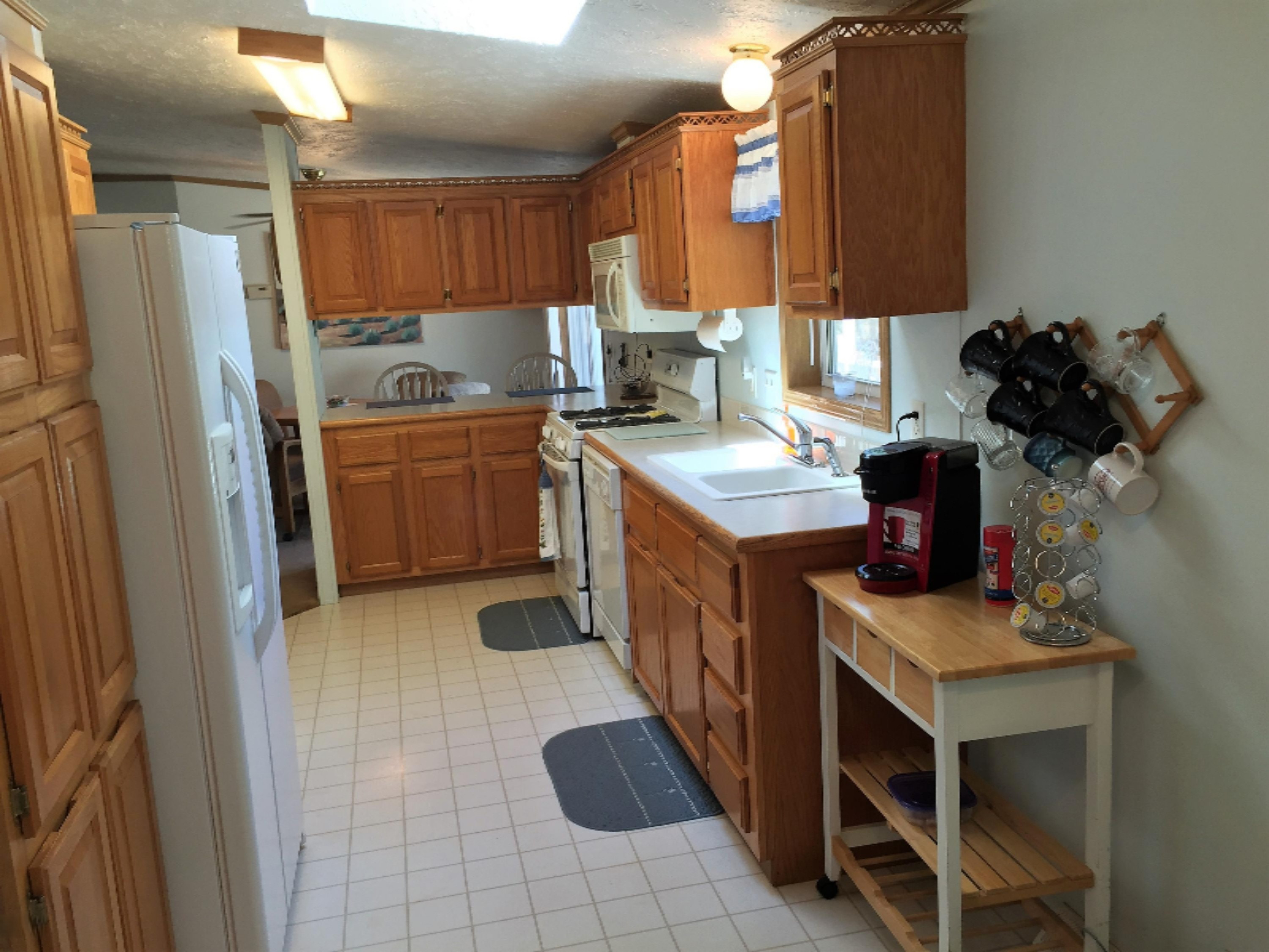 464 West Hoague Road Manistee, MI 49660 - Photo 12 of 27 From Breakfast Nook into Kitchen