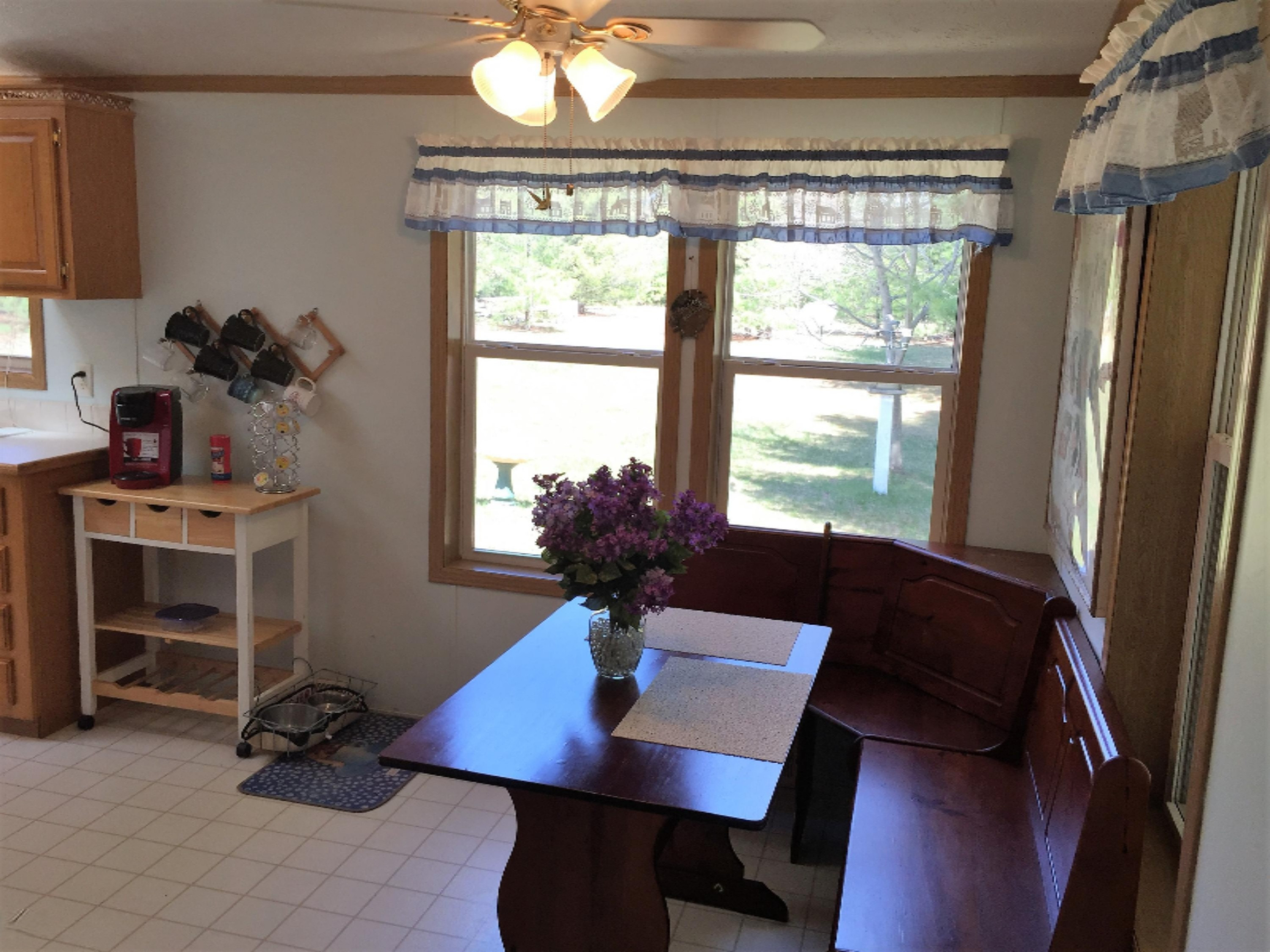 464 West Hoague Road Manistee, MI 49660 - Photo 13 of 27 Breakfast Nook looking out to Back Yard