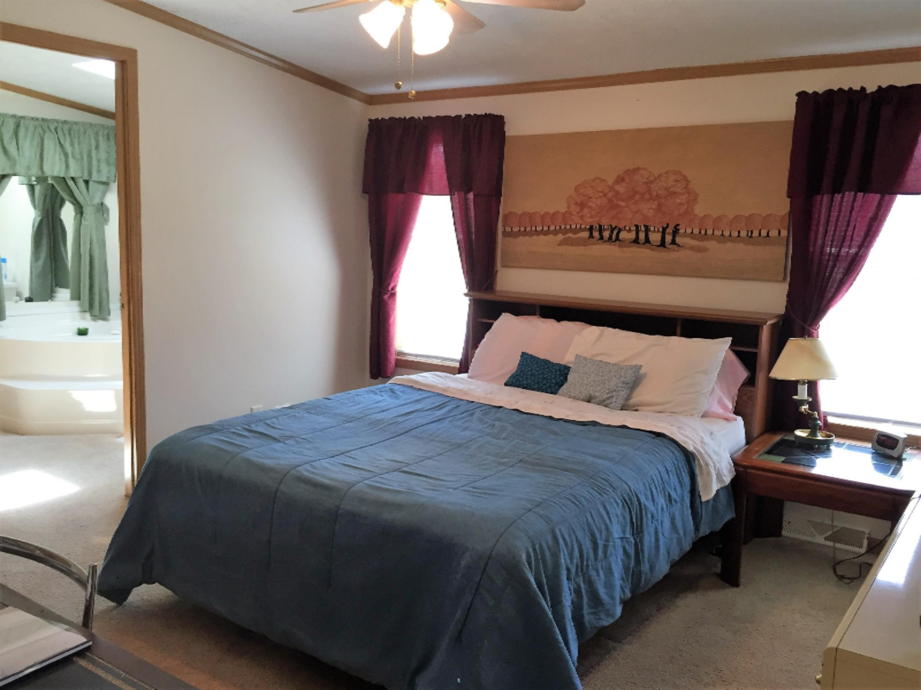 464 West Hoague Road Manistee, MI 49660 - Photo 16 of 27 Master Bedroom and attached Bathroom