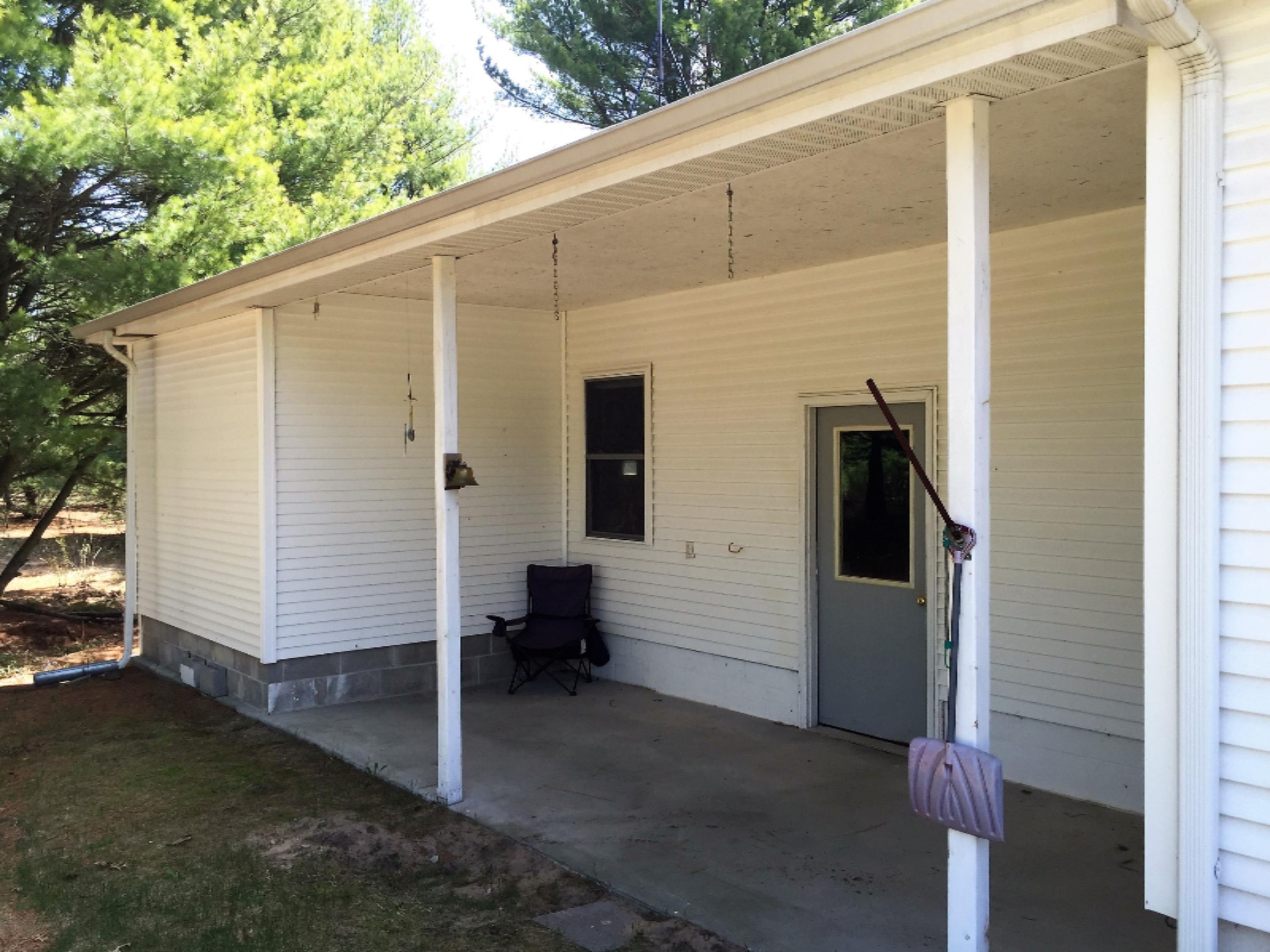 464 West Hoague Road Manistee, MI 49660 - Photo 25 of 27 Back Yard Patio
