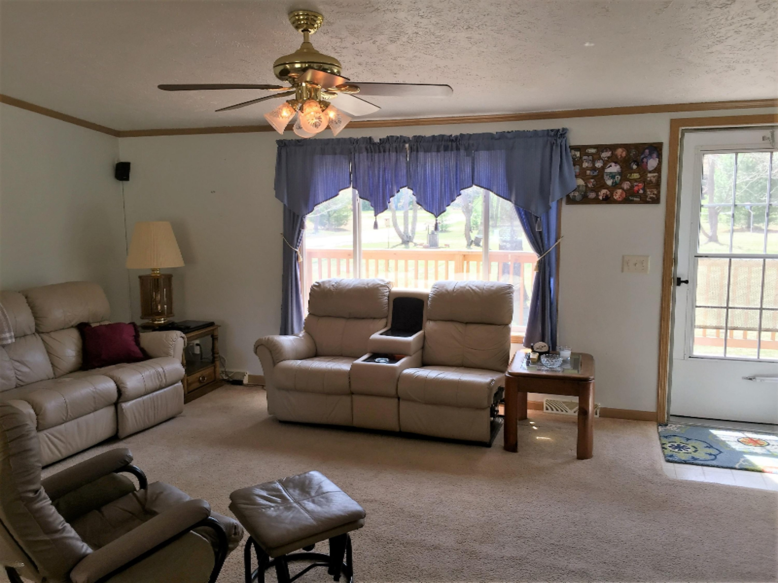 464 West Hoague Road Manistee, MI 49660 - Photo 4 of 27 Living Room and Front Door