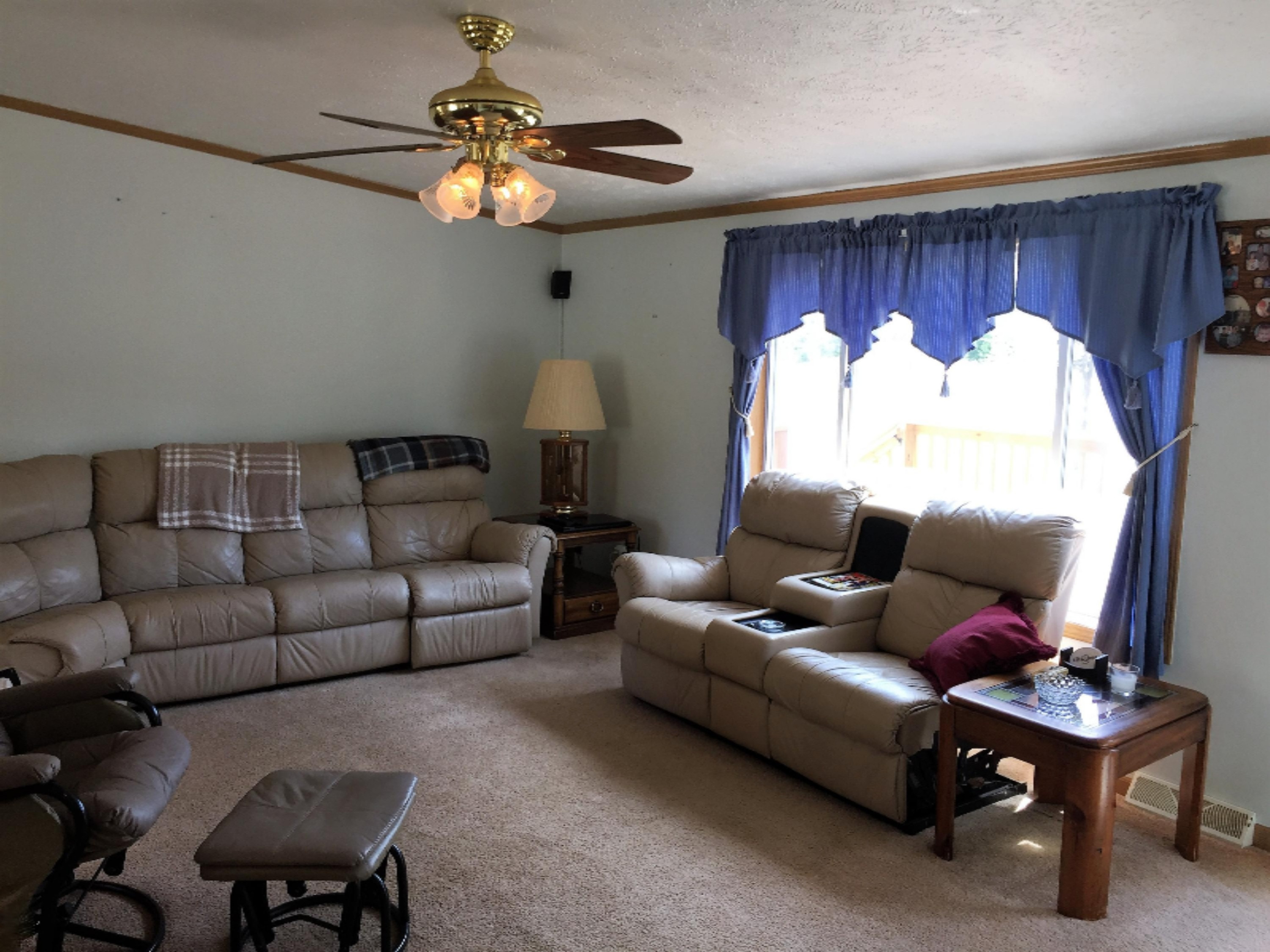 464 West Hoague Road Manistee, MI 49660 - Photo 5 of 27 Living Room with Ceiling Fan