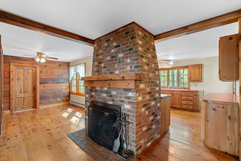 362 Snows Pond Road Rochester, MA 02770 - Photo 13 of 41 a living room with furniture and a fireplace
