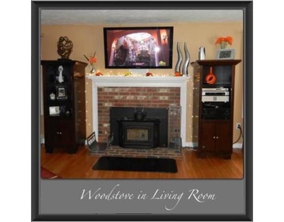 536 High Street Rochester, MA 02770 - Photo 5 of 15 a living room with furniture and a fireplace