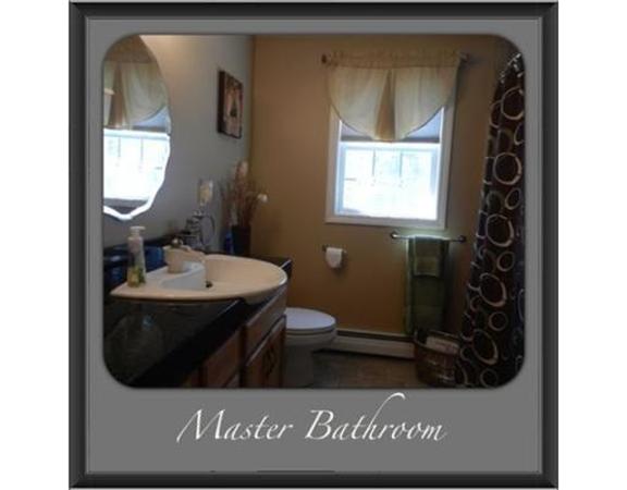 536 High Street Rochester, MA 02770 - Photo 10 of 15 a bathroom with a sink a mirror and a toilet