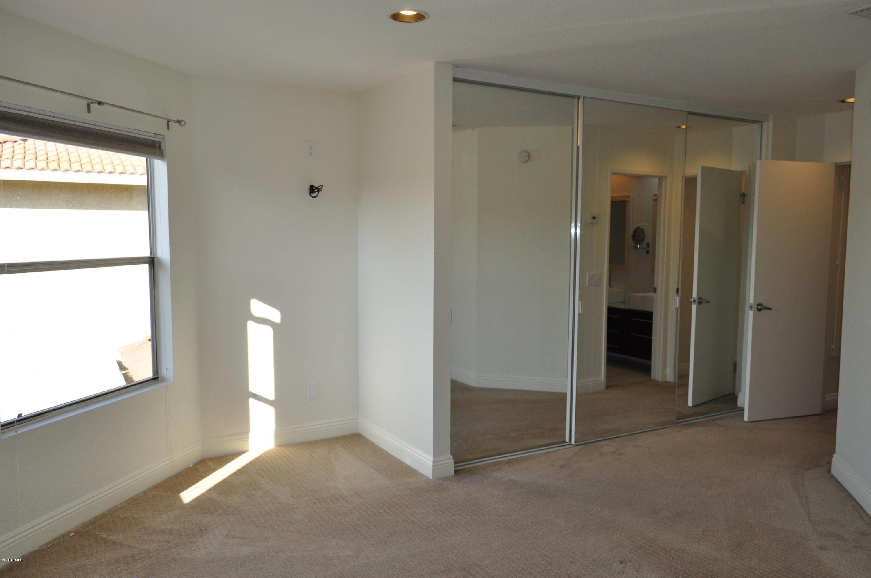 4852 Penrose Avenue Moorpark, CA 93021 - Photo 12 of 20 a view of an empty room with a window