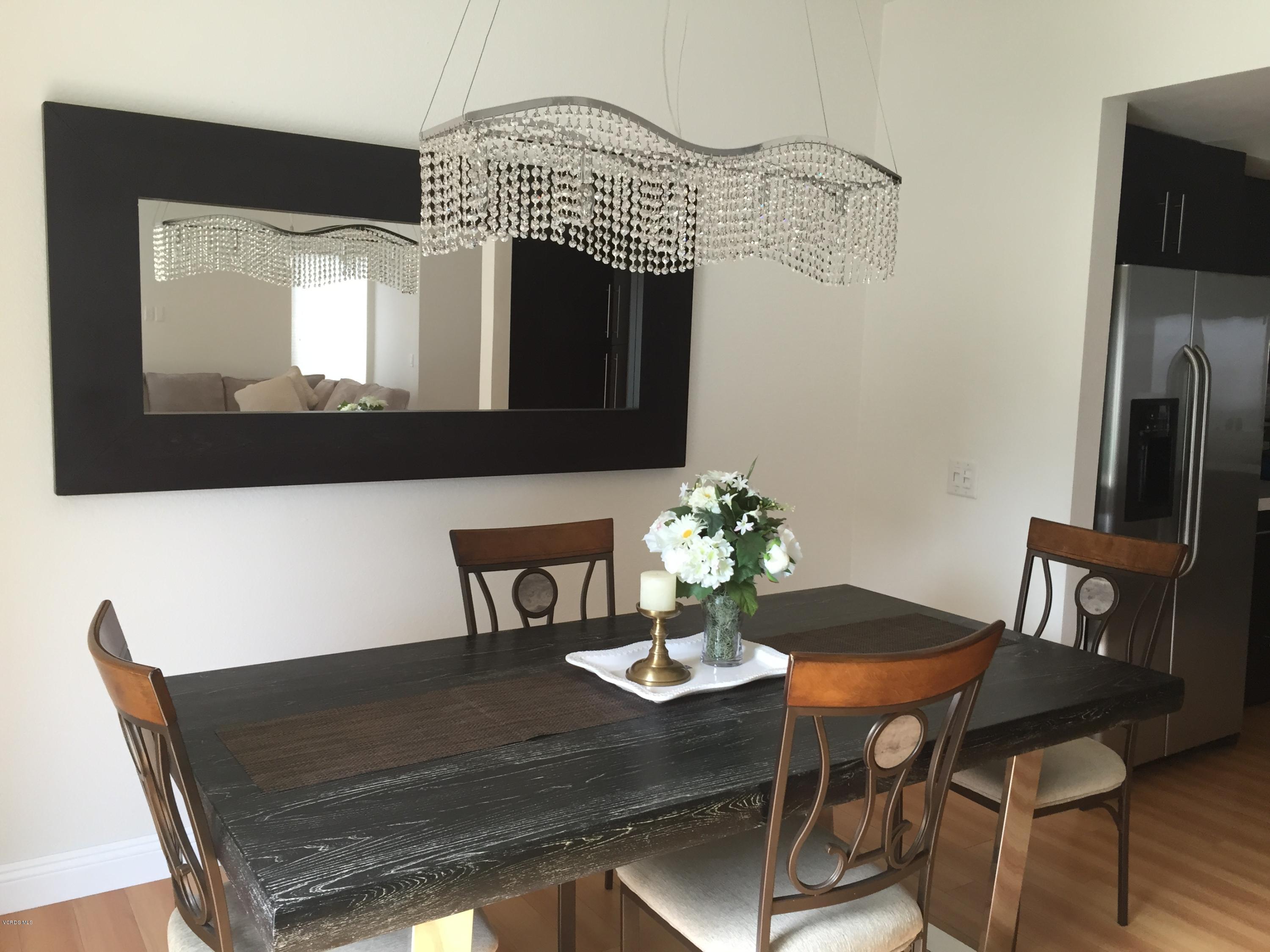 4852 Penrose Avenue Moorpark, CA 93021 - Photo 8 of 20 a view of a dining room with furniture