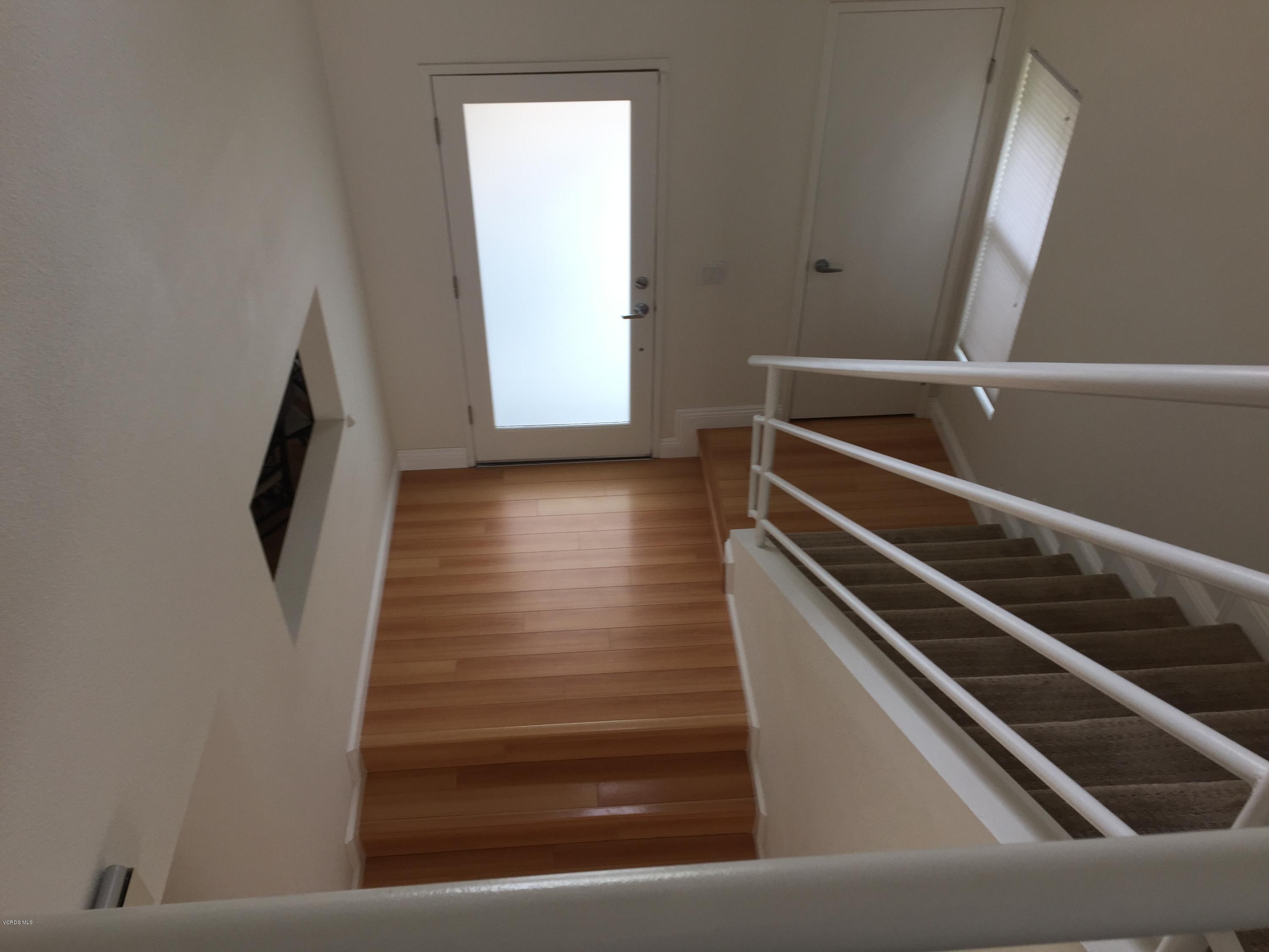 4852 Penrose Avenue Moorpark, CA 93021 - Photo 10 of 20 a view of staircase and living room