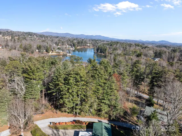 an aerial view of residential house and outdoor space