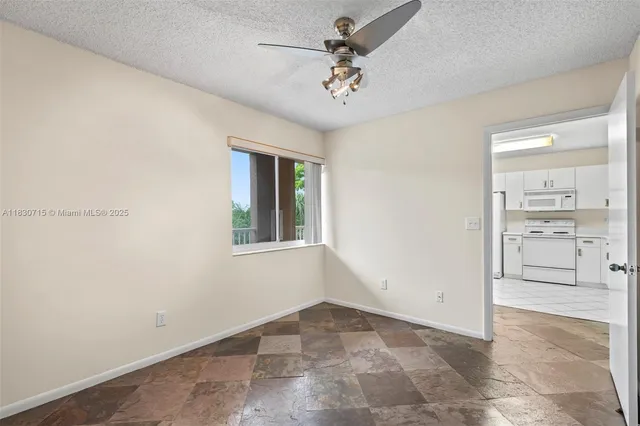 a bathroom with a sink toilet a mirror and shower
