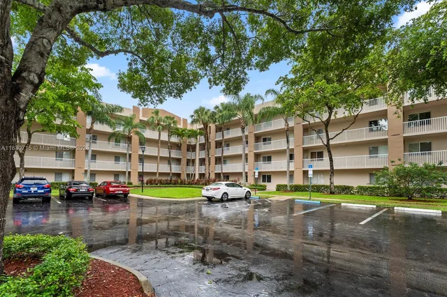 a view of a street with cars