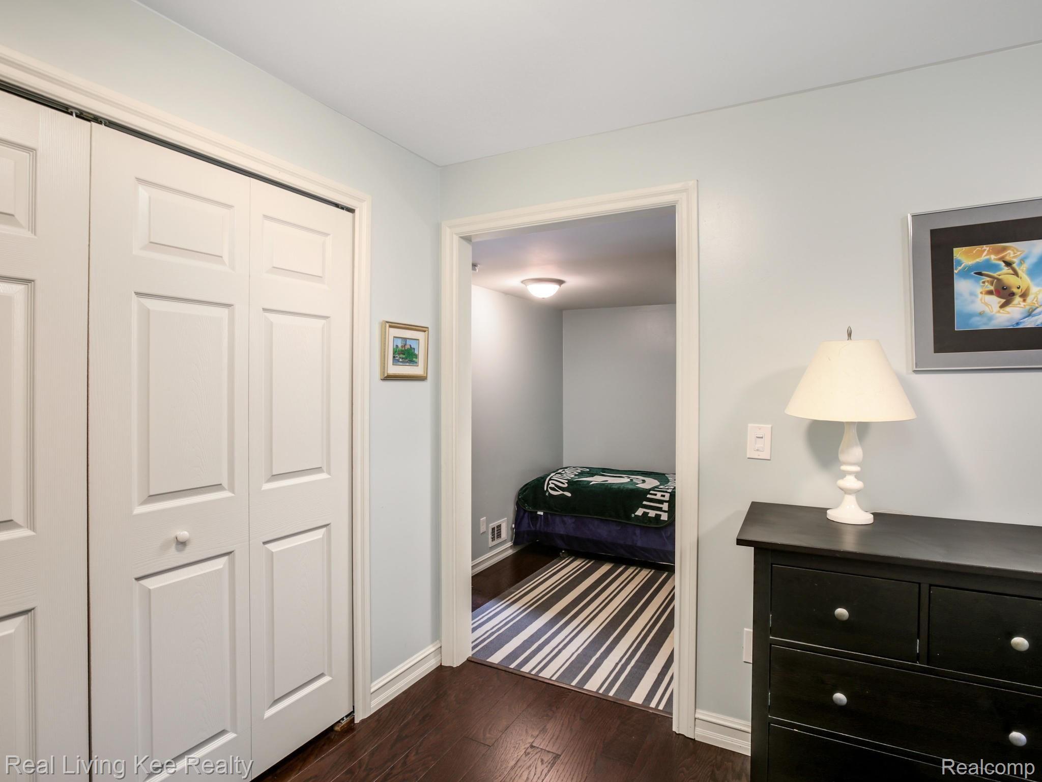 2412 Munster Road Rochester, MI 48309 - Photo 25 of 40 View from Bedroom#3 into a step-down room. Great space for office, study area or sleepovers
