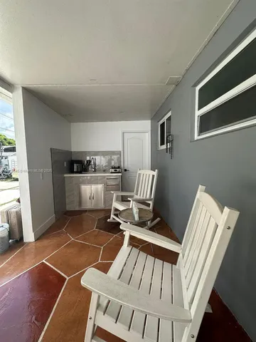 a view of a house with sitting area