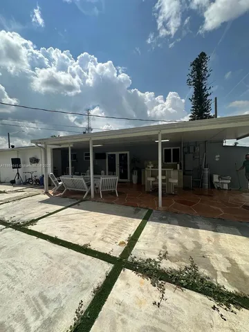 a room with furniture and windows