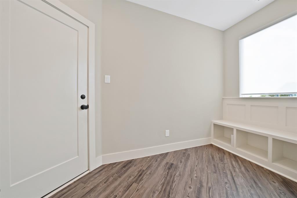 2223 Providence Way Nevada, TX 75173 - Photo 30 of 40 a view of a small space with wooden floor and a window