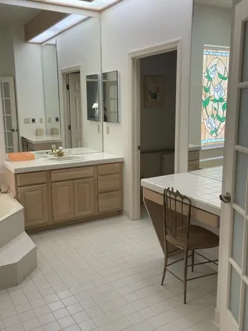 a view of a kitchen area with furniture and window