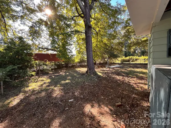 a view of a tree with an outdoor space