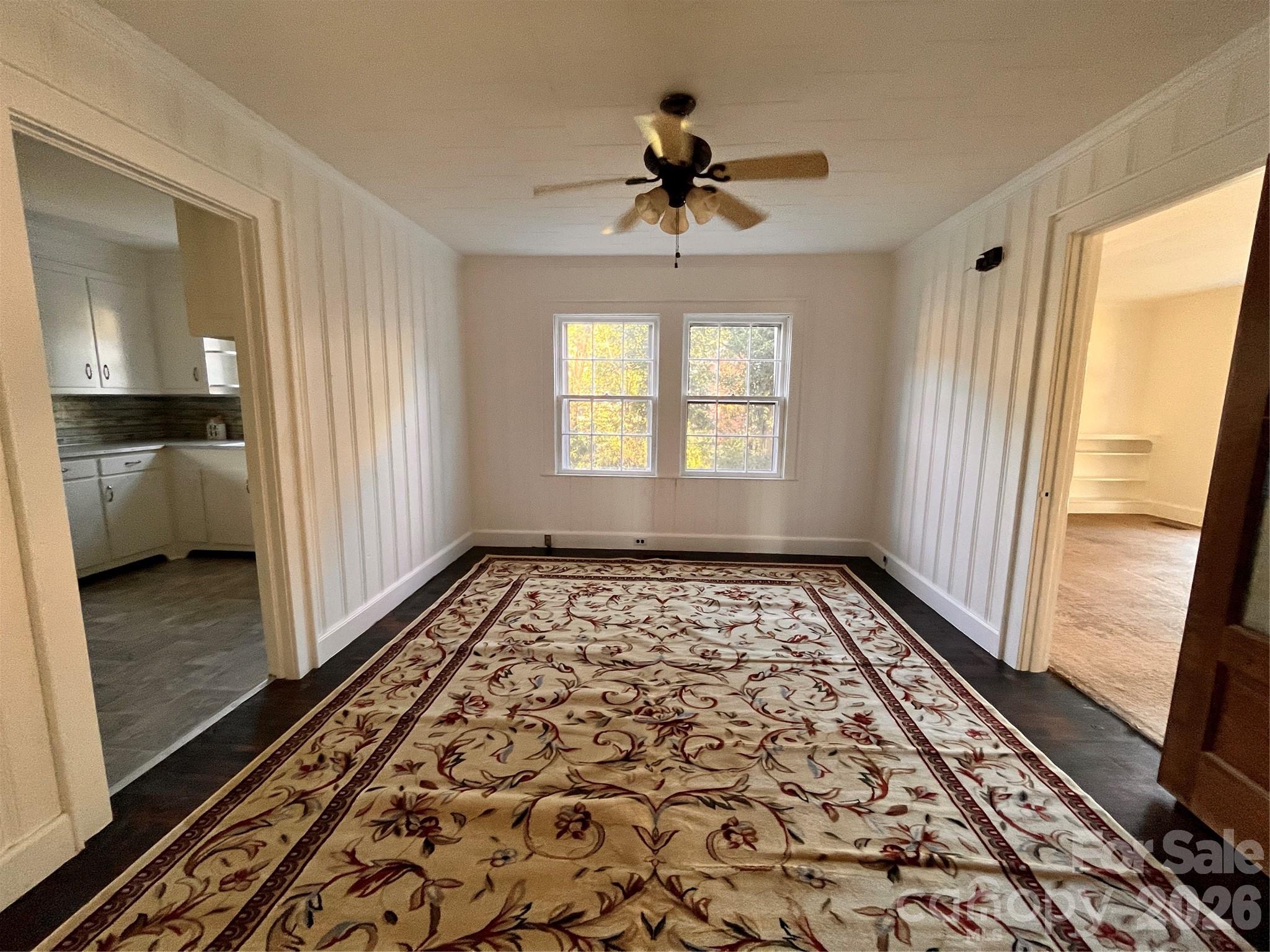 704 McAdenville Road Lowell, NC 28098 - Photo 5 of 14 a view of an empty room and window