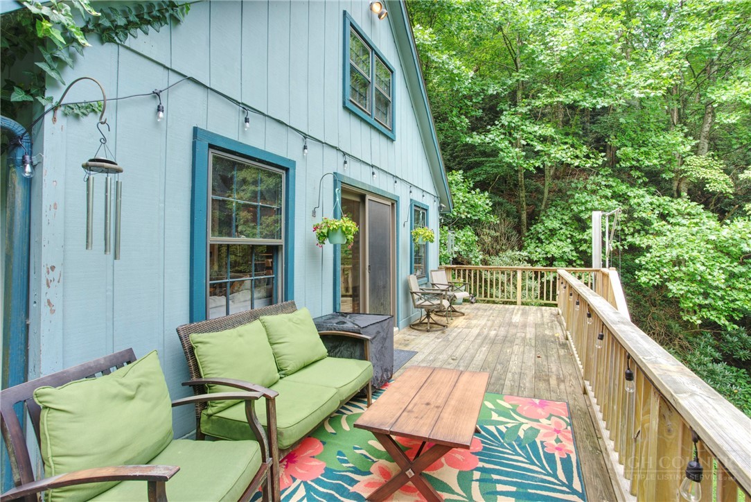9440 Blackberry Road Lenoir, NC 28645 - Photo 22 of 30 a view of a chairs on the deck