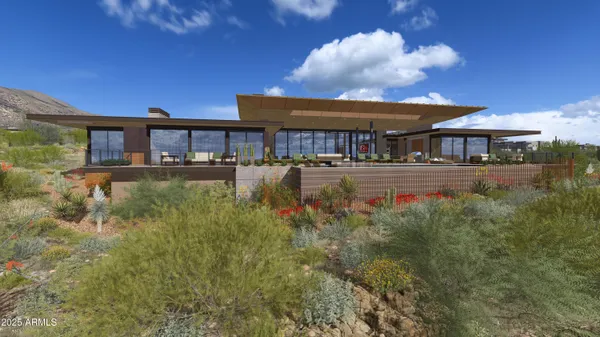 a view of a house with a yard balcony and sitting area