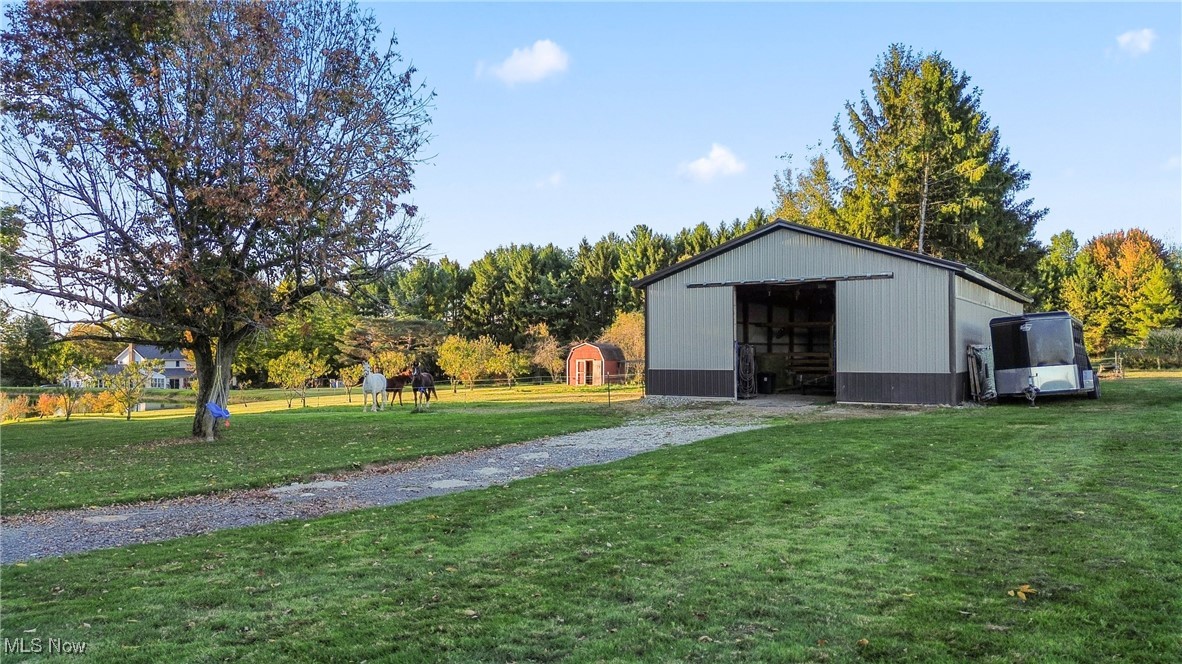 3804 Ridge Road Cortland, OH 44410 - Photo 2 of 44 View of pole building with a lawn