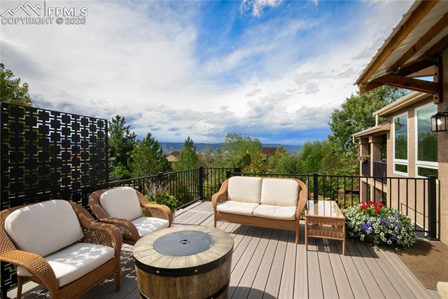 15110 Ridgefield Lane Colorado Springs, CO 80921 - Photo 38 of 50 Newer composite 15 x 16 deck with awning