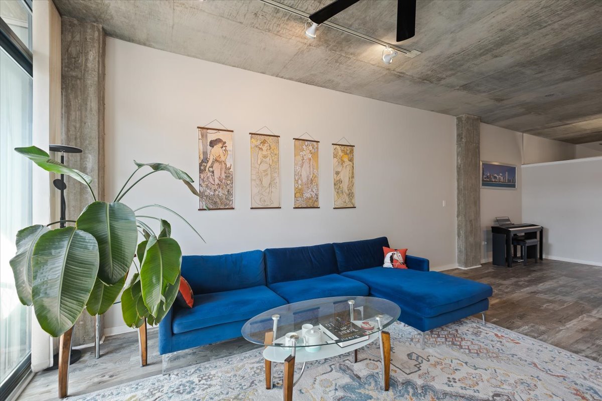 321 South Sangamon Street, Unit 508 Chicago, IL 60607 - Photo 16 of 29 a living room with furniture and a potted plant
