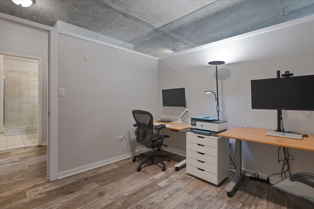 321 South Sangamon Street, Unit 508 Chicago, IL 60607 - Photo 10 of 29 a view of a workspace with furniture and a window