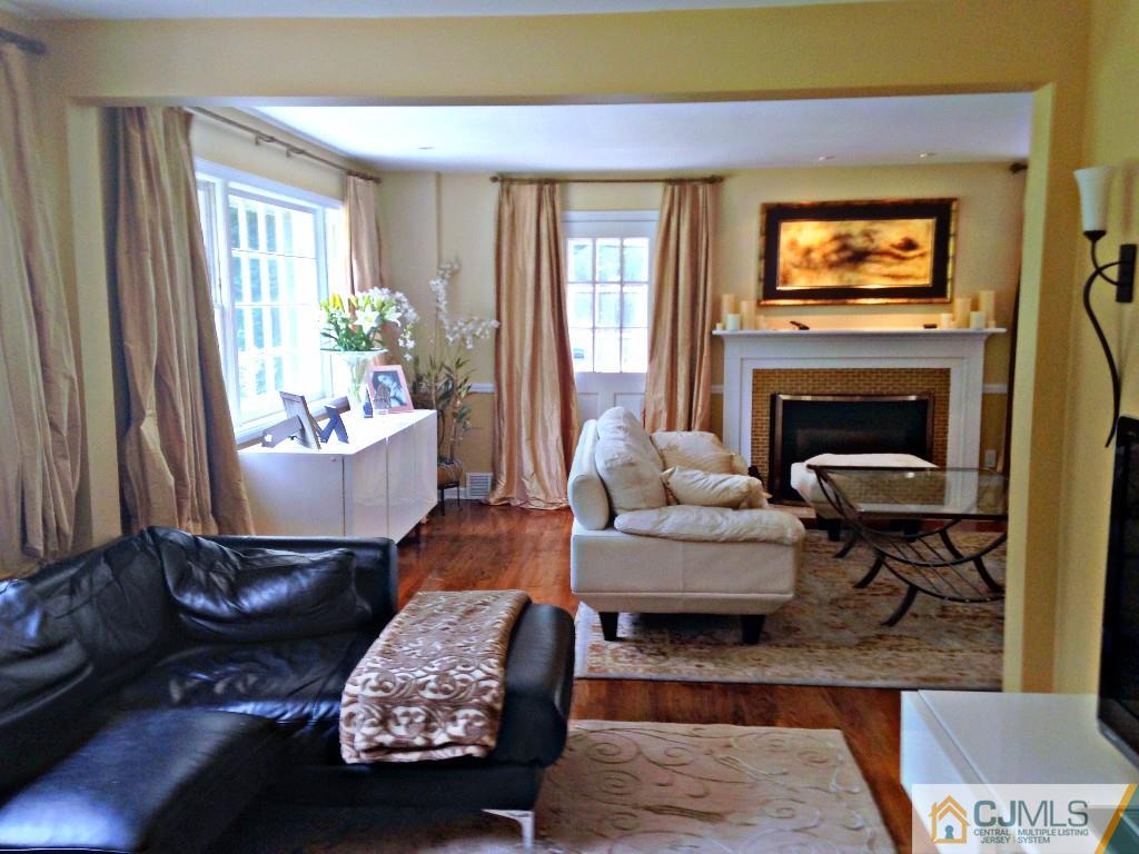 101 Red Hill Road Princeton, NJ 08540 - Photo 18 of 22 a living room with furniture and a fireplace