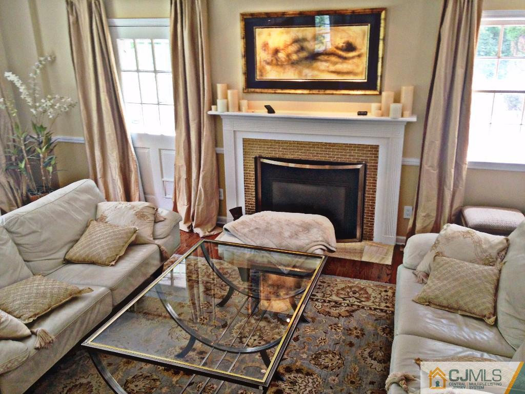 101 Red Hill Road Princeton, NJ 08540 - Photo 20 of 22 a living room with furniture and a fireplace