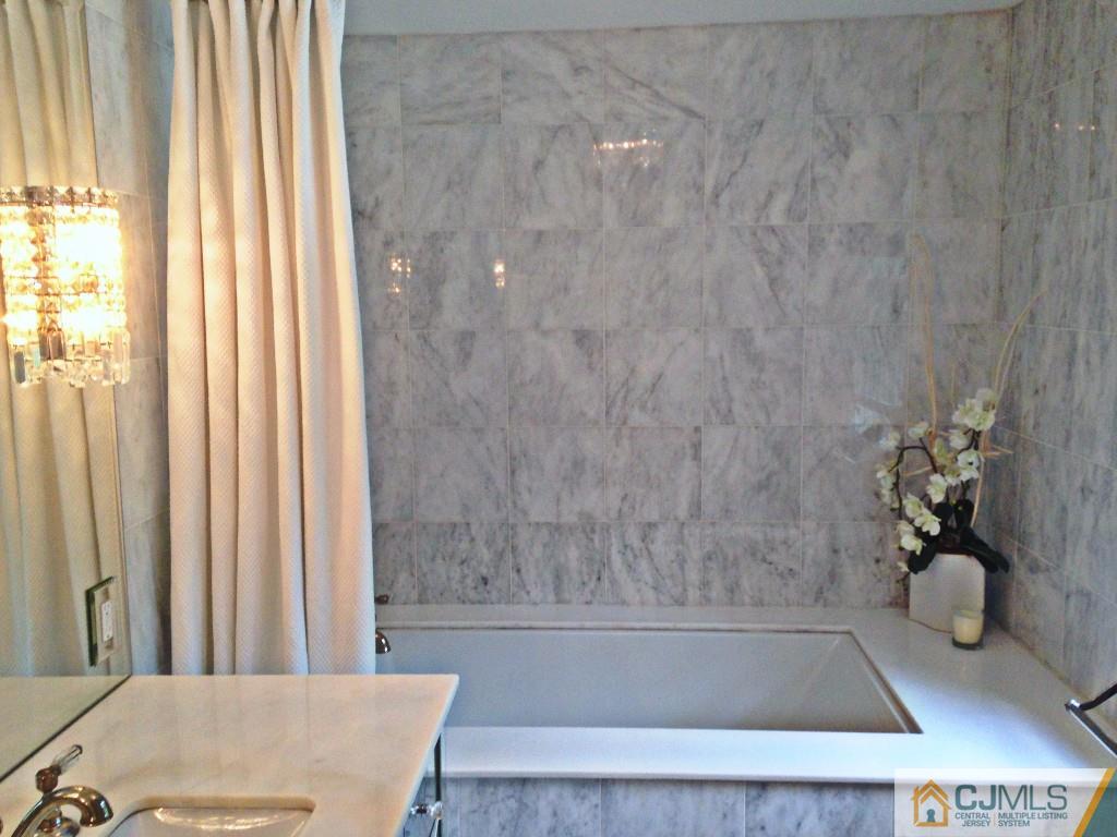 101 Red Hill Road Princeton, NJ 08540 - Photo 21 of 22 a bathroom with a tub and shower
