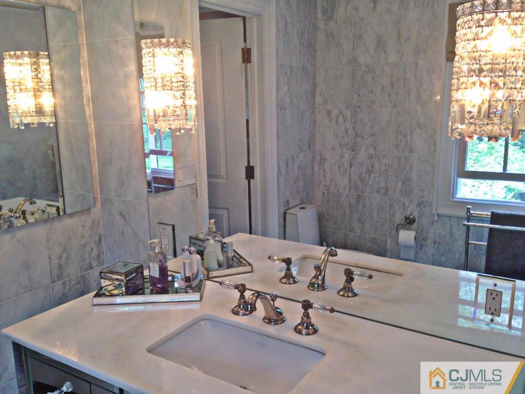 101 Red Hill Road Princeton, NJ 08540 - Photo 22 of 22 a bathroom with a sink and a mirror