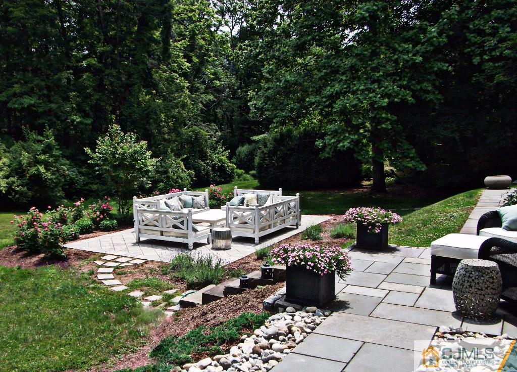 101 Red Hill Road Princeton, NJ 08540 - Photo 4 of 22 a view of backyard with outdoor seating and green space