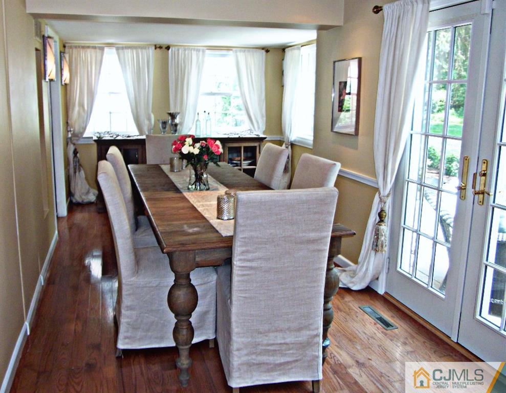 101 Red Hill Road Princeton, NJ 08540 - Photo 5 of 22 a view of a dining room with furniture and wooden floor