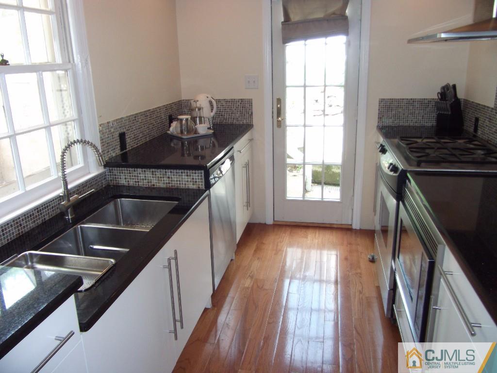 101 Red Hill Road Princeton, NJ 08540 - Photo 8 of 22 a kitchen that has a sink and a stove