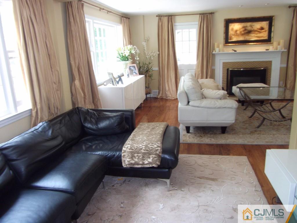 101 Red Hill Road Princeton, NJ 08540 - Photo 9 of 22 a living room with furniture and a fireplace