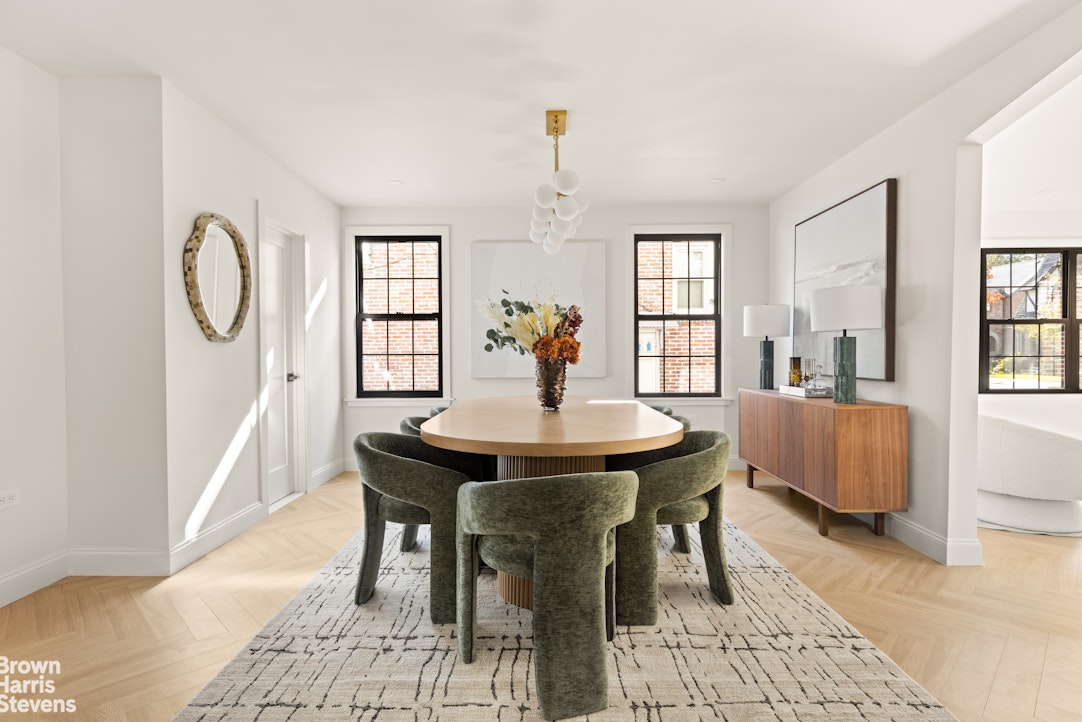 85-03 Wareham Place Queens, NY 11432 - Photo 3 of 21 a view of a a dining room with furniture window and wooden floor