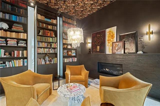 a backyard of a house with outdoor seating