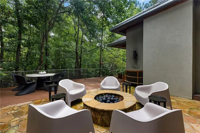 a view of a balcony with chairs