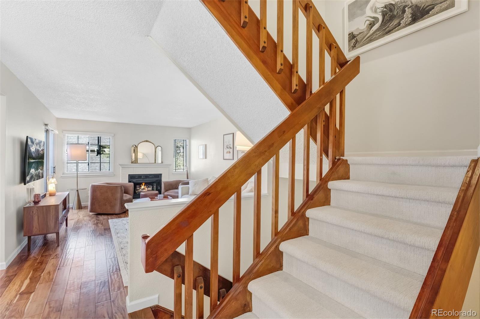 1470 South Quebec Way, Unit 282 Denver, CO 80231 - Photo 11 of 38 a view of entryway and hall with wooden floor