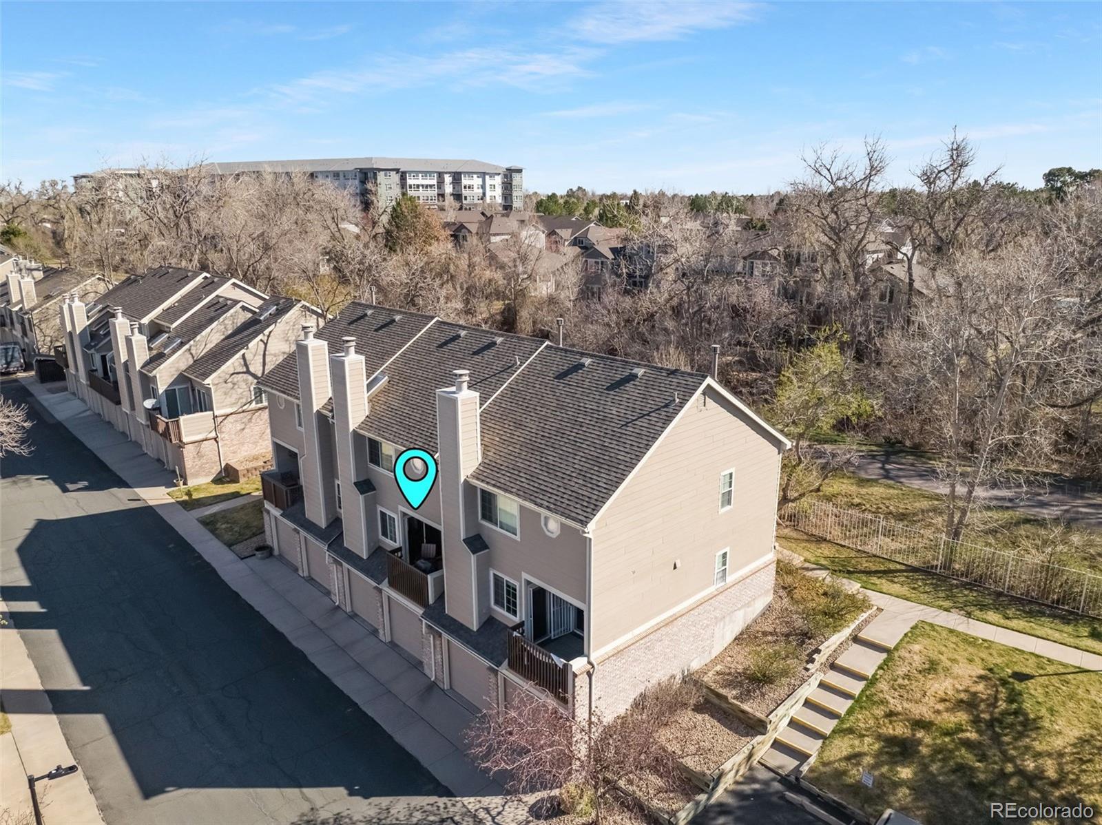 1470 South Quebec Way, Unit 282 Denver, CO 80231 - Photo 35 of 38 a view of a house with a outdoor space