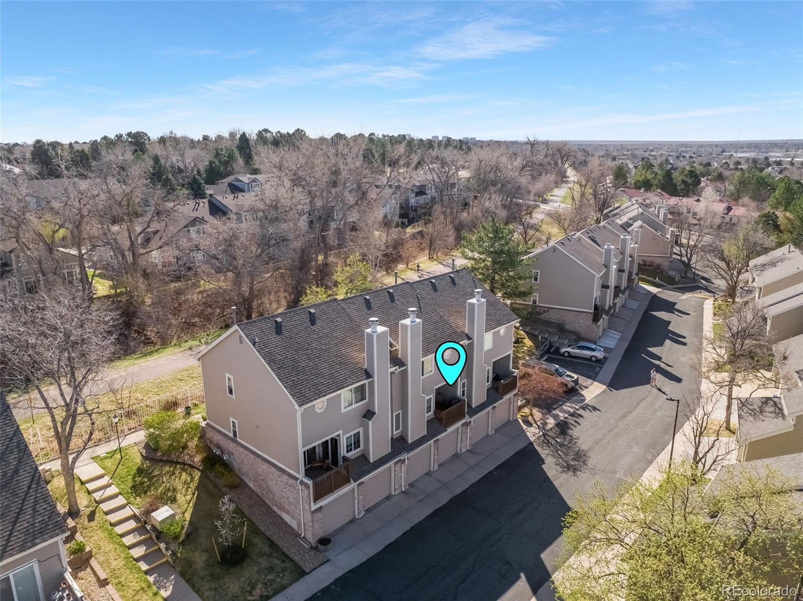 1470 South Quebec Way, Unit 282 Denver, CO 80231 - Photo 37 of 38 aerial view of a house with a garden