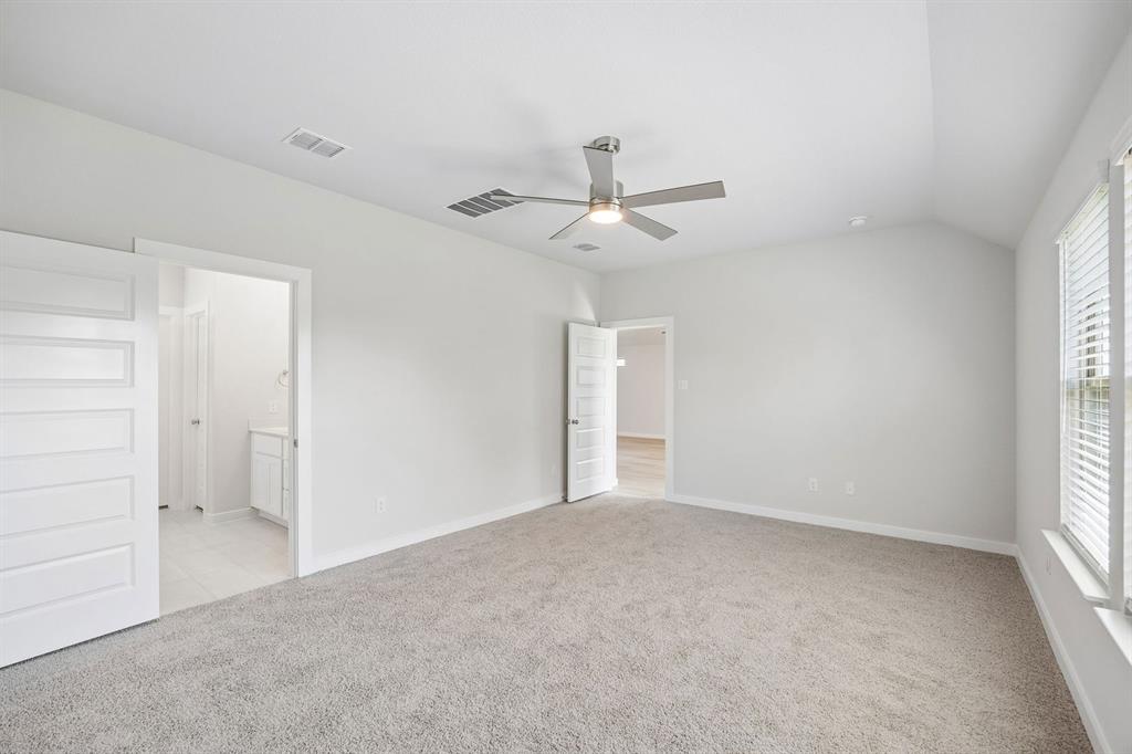 1448 Companero Street Haslet, TX 76052 - Photo 18 of 35 a view of an empty room and a window