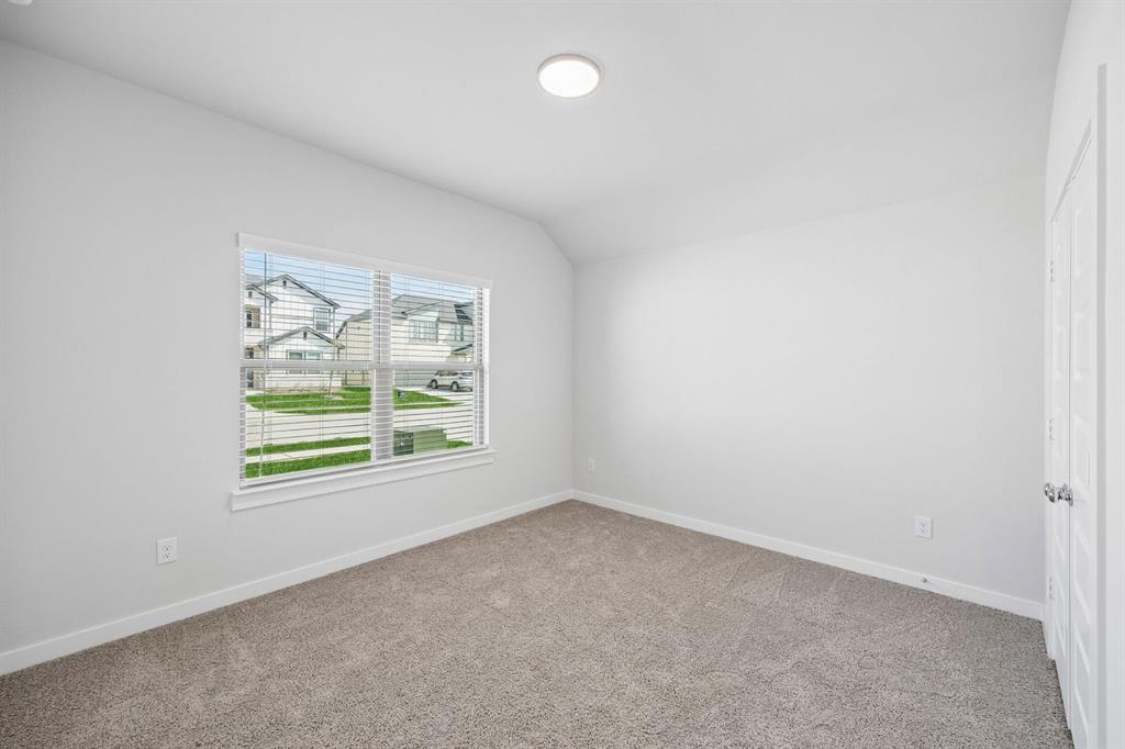 1448 Companero Street Haslet, TX 76052 - Photo 23 of 35 an empty room with a window